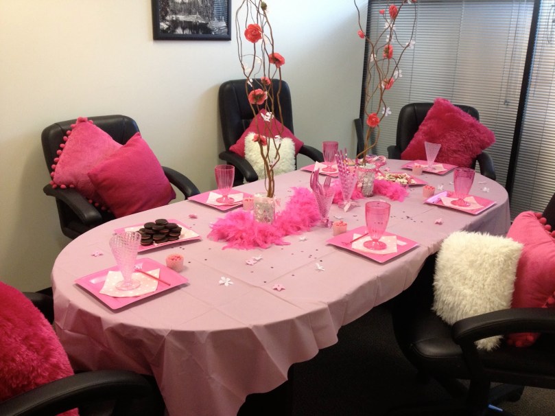"Your new soft pink boardroom decor, courtesy of soft pink lady board members!"